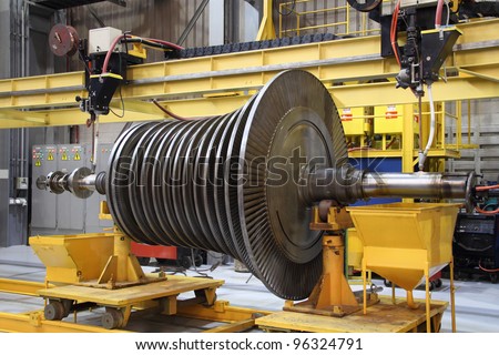 Steam turbine being worked on in an industrial manufacturing factory