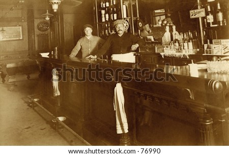 Vintage photo of two bartenders behind bar