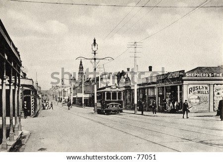 Vintage photo of the main street of a town, circa 1900