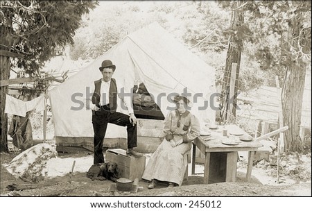 Vintage Photo of a Couple Camping With Tent