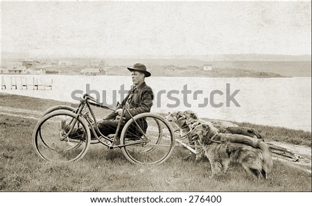 Vintage Photo of a Recumbent Bike Towing Dogs