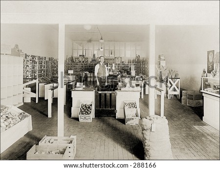 Vintage photo of a Grocer In His General Store
