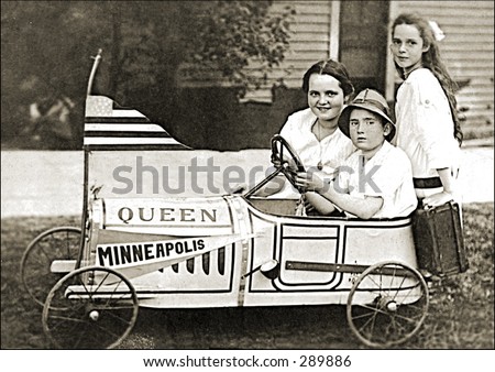 Vintage Photo of a Soapbox Racing Car And Driver With Sisters