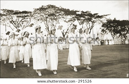 Vintage photo of Nurses In Uniform Marching For A Cause