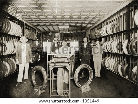 Vintage photo of Salesmen In Tire Store Showroom