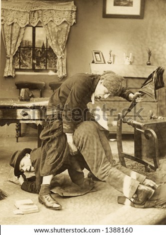 Vintage photo of a Man Being Spanked