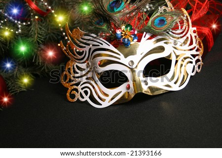 Mask and Christmas light. the mask is isolated on a black background