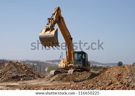 backhoe chains of working in an earth moving