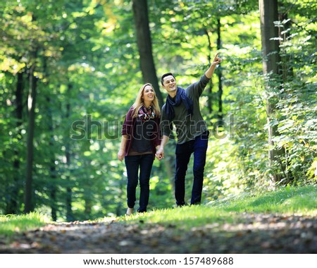 going for a walk through the forest on a romantic date