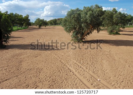 Car track at dried river outback Australia
