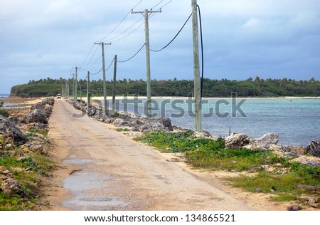 Road between islands in rural area, South Pacific, Tonga