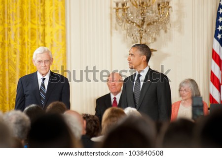 WASHINGTON - MAY 29: President Barack Obama (R) looks at John Doar prior to awarding him the Presidential Medal of Freedom at a ceremony at the White House May 29, 2012 in Washington, D.C.