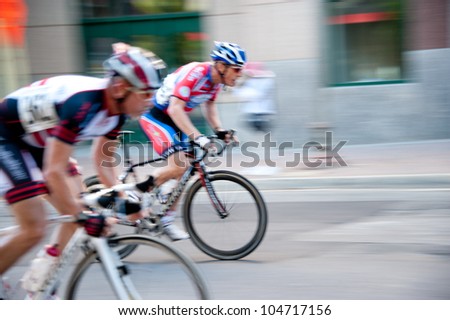 ARLINGTON, VIRGINIA - JUNE 9: Cyclists compete in the Masters 40+ race at the U.S. Air Force Cycling Classic on June  9, 2012 in Arlington, Virginia