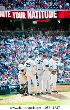 WASHINGTON - JUNE 16:  Yankee players on the mound during the Washington Nationals - New York Yankees game, which the Yankees won after 14 innings of play, on June 16, 2012 in Washington, D.C.