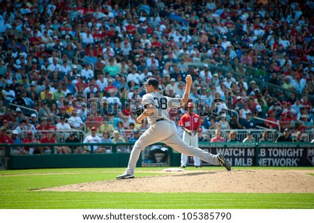 WASHINGTON - JUNE 16:  Cody Eppley pitches during the hard-fought Washington Nationals Ã¢Â?Â? New York Yankees game, which the Yankees won after 14 innings of play, on June 16, 2012 in Washington, D.C.
