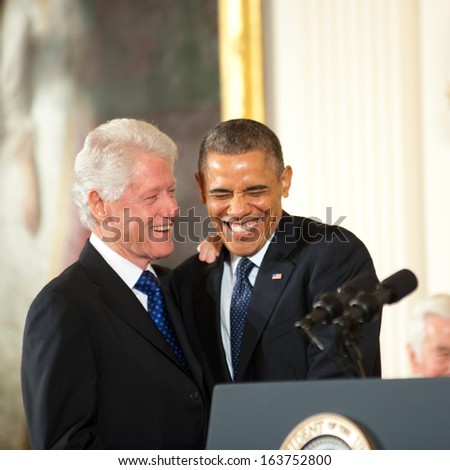 Washington - November 20: Former President Bill Clinton And President Barack Obama Share A Laugh Before Clinton Receives The Presidential Medal Of Freedom On November 20, 2013 In Washington, Dc.