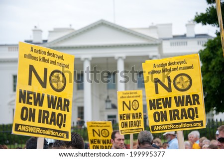 WASHINGTON, DC- JUNE 21: Anti-war demonstrators protest in front of the White House in Washington, DC on June 21, 2014.