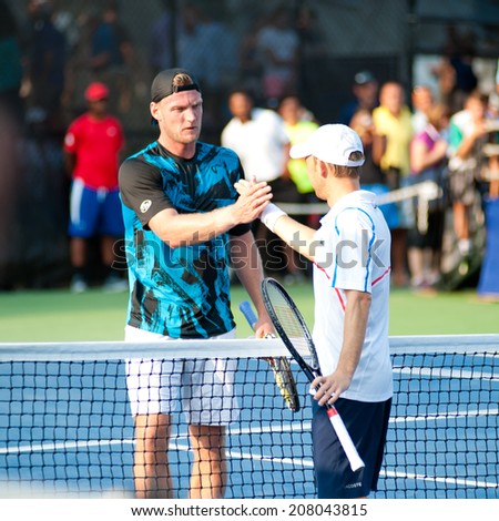 WASHINGTON - JULY 29:  Sam Groth (AUS) and Dudi Sela (ISR) shake hands after Sela\'s winning match at the Citi Open tennis tournament on July 29, 2014 in Washington DC