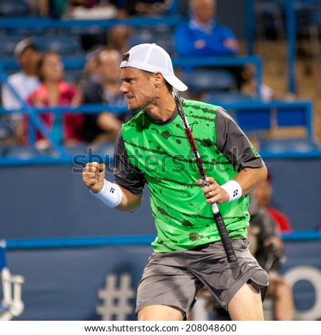 WASHINGTON - JULY 29: Lleyton Hewitt (AUS) fist pumps during his winning match against Marinko Matosevic (AUS, not pictured) at the Citi Open tennis tournament on July 29, 2014 in Washington DC
