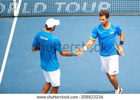 WASHINGTON  AUGUST 3: Jean-Julien Rojer (NED) and Horia Tecau (ROU) take the doubles final title at the Citi Open tennis tournament on August 3, 2014 in Washington DC