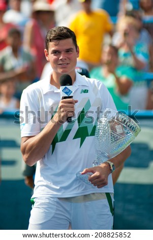 WASHINGTON  AUGUST 3: Milos Raonic speaks to the crowd after defeating fellow Canadian Vasek Pospisil to take the men\'s title at the Citi Open tennis tournament on August 3, 2014 in Washington DC