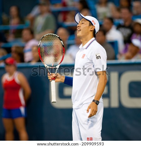 WASHINGTON - AUGUST 1: Kei Nishikori (JPN) falls to Richard Gasquet  (FRA, not pictured) at the Citi Open tennis tournament on August 1, 2014 in Washington DC