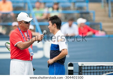 WASHINGTON AUGUST 7: Kei Nishikori (JPN) is interviewed after defeating Sam Groth (AUS, not pictured) at the Citi Open tennis tournament on August 7, 2015 in Washington DC