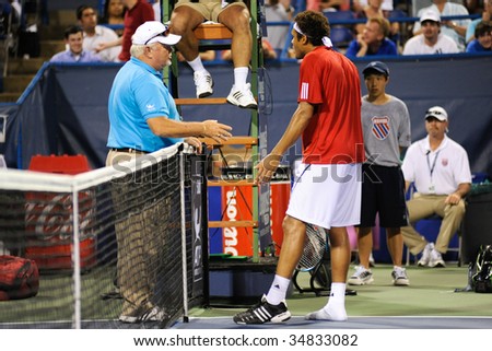 stock-photo-washington-d-c-august-jo-wilfried-tsonga-fra-argues-a-controversial-call-about-his-shoe-34833082.jpg