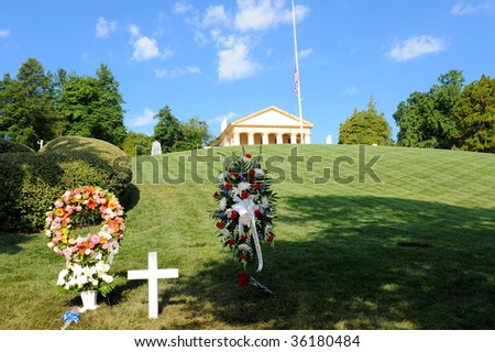 WASHINGTON - AUGUST 30: Wreaths lie at the Arlington Cemetery grave of U.S. Senator Edward Kennedy (D-MA) on August 30, 2009 in Arlington, VA. Kennedy was buried yesterday.