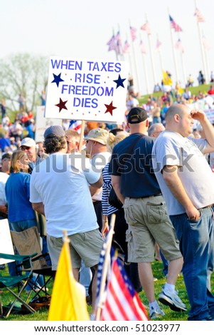WASHINGTON - APRIL 15: Protesters at the tax day tea party rally at the Washington monument on April 15, 2010 in Washington, D.C.