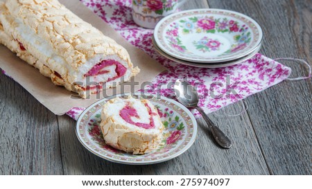 meringue roll cake with berry curd