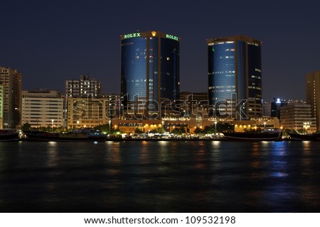 DUBAI, UAE - NOVEMBER 18: Deira Twin Towers in Dubai Creek at November 18, 2010. Twin Towers are constructed on April 16th 1998 and height of each building is 102m.