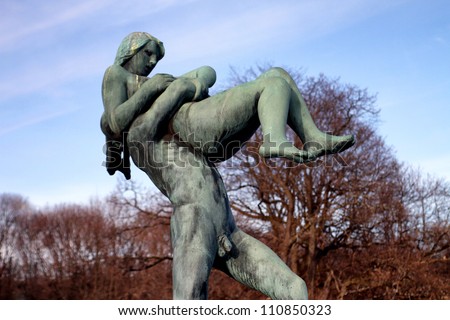 OSLO, NORWAY - MARCH 13: Statues in Vigeland park in Oslo, Norway on March 13, 2012.The park covers 80 acres and features 212 bronze and granite sculptures created by Gustav Vigeland.