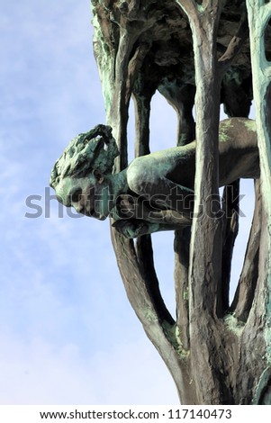 OSLO, NORWAY - MARCH 13: Statue in Vigeland park in Oslo, Norway on March 13, 2012.The park covers 80 acres and features 212 bronze and granite sculptures created by Gustav Vigeland.