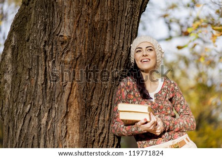 Young woman with books