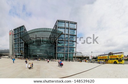 BERLIN, GERMANY - JULY 10: Unidentified people in front of the Berlin Central Train Station at July 10, 2013 in Berlin. Daily number of passengers at Berlin Train Station is estimated to be 350,000.