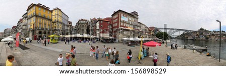 PORTO, PORTUGAL - SEPTEMBER 5: Unidentified people on the street of Porto, Portugal at September 5, 2013. Historic Centre of Porto is a UNESCO World Heritage Site since 1996.