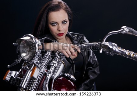 Young woman on motorcycle