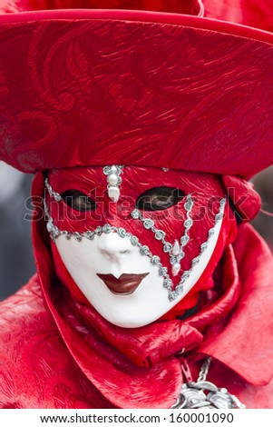 VENICE, ITALY - FEBRUARY 10: Unidentified person with Venetian carnival mask in Venice, Italy on February 10, 2013. At 2013 it is held from January 26th to February 12th.