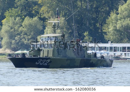 NOVI SAD, SERBIA - SEPTEMBER 6: River minesweeper RML-332 Motajica of the Serbian Armed Forces River Flotilla at Danube river in Novi Sad, Serbia at September 6, 2013