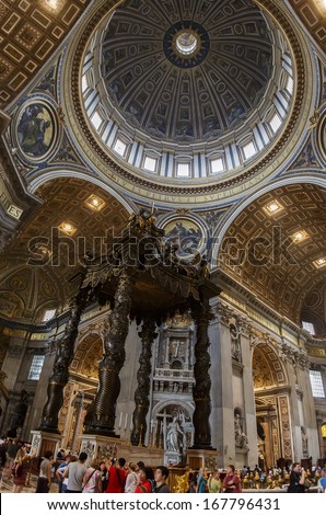 VATICAN - JULY 19: Unidentified people at interior of the Saint Peter Cathedral in Vatican on July 19, 2013. Saint Peter\'s Basilica has the largest interior of any Christian church in the world.