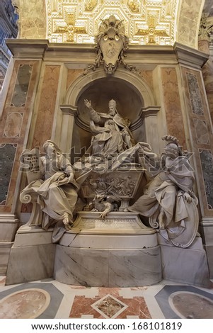 VATICAN - JULY 19: Monument to Gregory XIII at the Saint Peter Cathedral in Vatican on July 19, 2013. Saint Peter\'s Basilica has the largest interior of any Christian church in the world.
