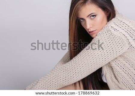 Pretty young woman in the sweater