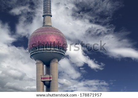 SHANGHAI, CHINA - DECEMBER 14, 2013: View at Oriental Pearl TV tower in Shanghai. Tower is opened at 1994 and have height of 468 m.