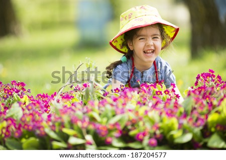 Little girl in the garden