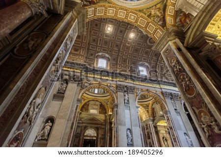 VATICAN - JULY 19, 2013: Interior of the Saint Peter Cathedral in Vatican. Saint Peter\'s Basilica has the largest interior of any Christian church in the world.