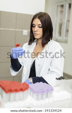 Young woman in the medical laboratory