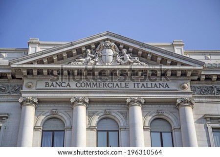 MILAN, ITALY - MARCH 8, 2014: Building of Banca Commerciale Italiana in Milan. Bank is founded at 1894, was once one of the largest banks in Italy and today is part of Intesa Sanpaolo group.