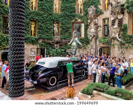 FIGUERES, SPAIN - SEPTEMBER 8, 2010: Unidentified people at Dali\'s Museum in Figueres, Spain. Salvador Dali is buried in a crypt in the Museum basement.
