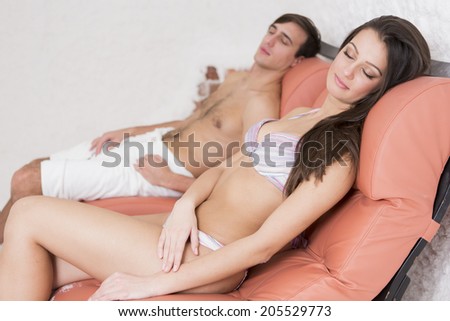 Young couple relaxing in the salt room